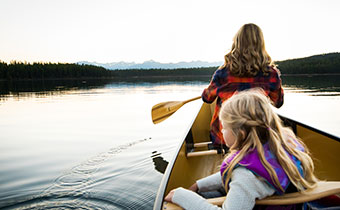 family on canoe